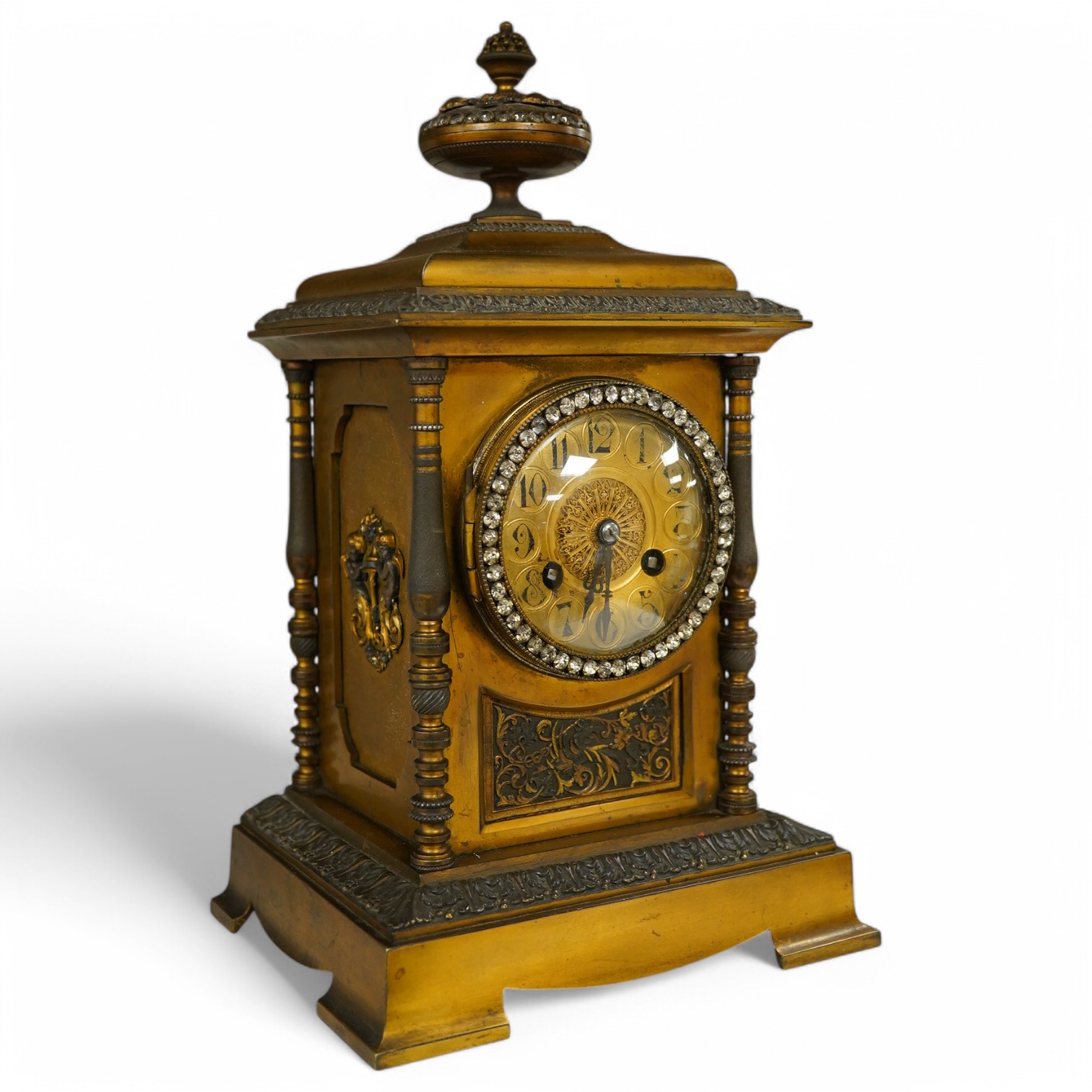 A late 19th century French brass mantel clock, 29cm high. Condition - fair.